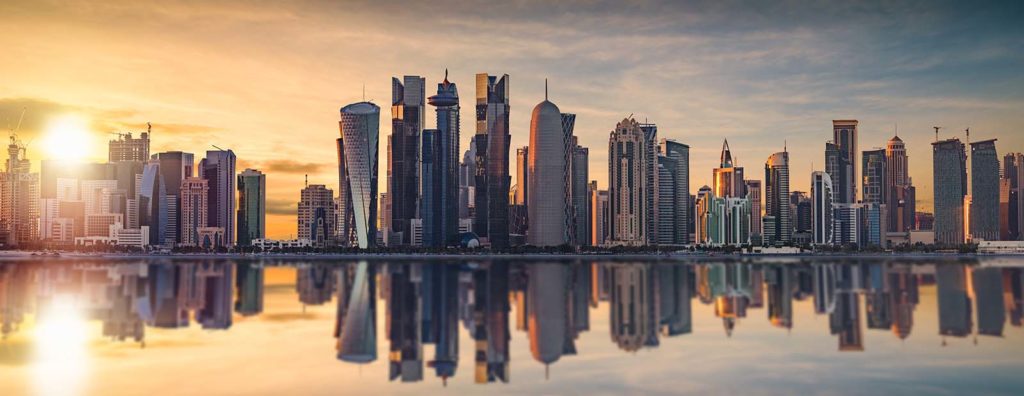 The skyline of Doha, Qatar during sunset