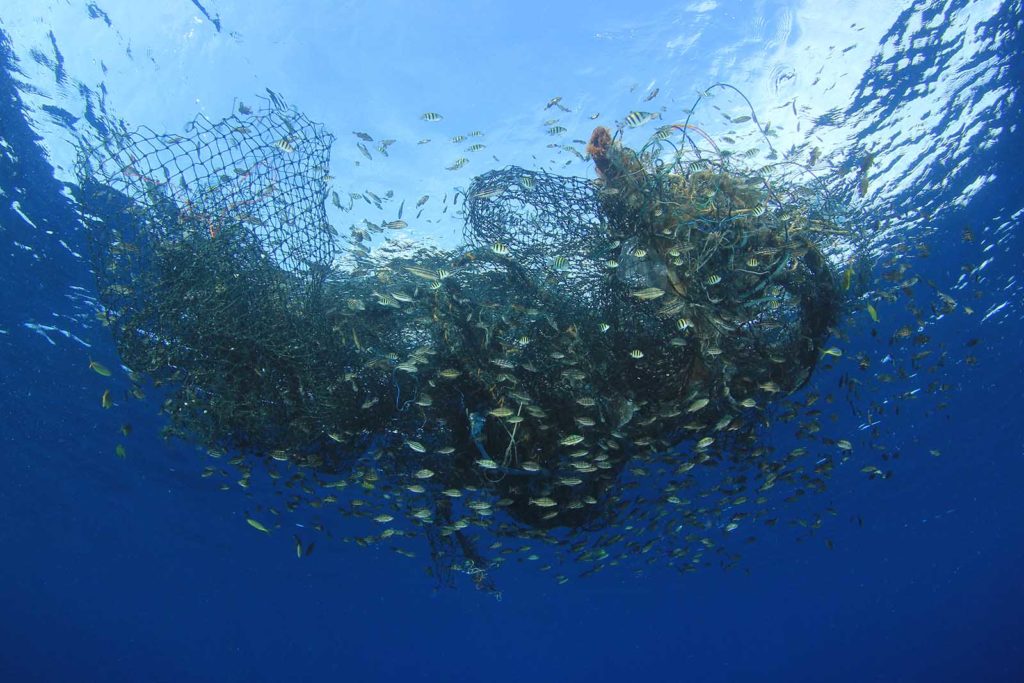 Abandoned fishing net polluting ocean marine environment
