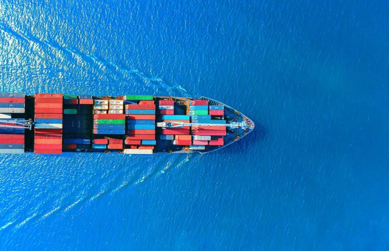 Aerial view of container ship fully loaded