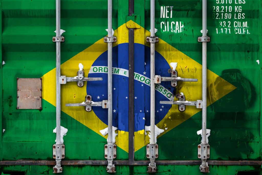 Closeup of a shipping container with the national flag of Brazil