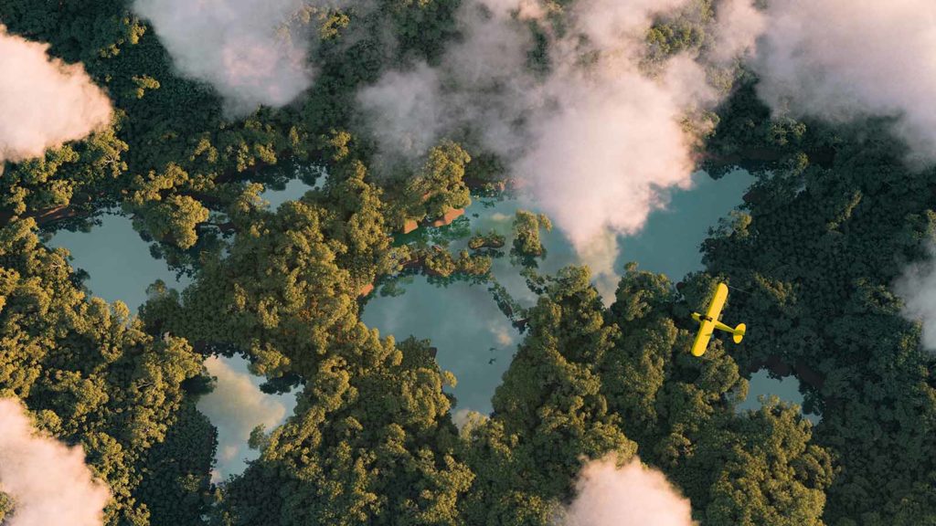 Sustainable habitat world concept - aerial view of a dense rainforest vegetation with airplane flying over