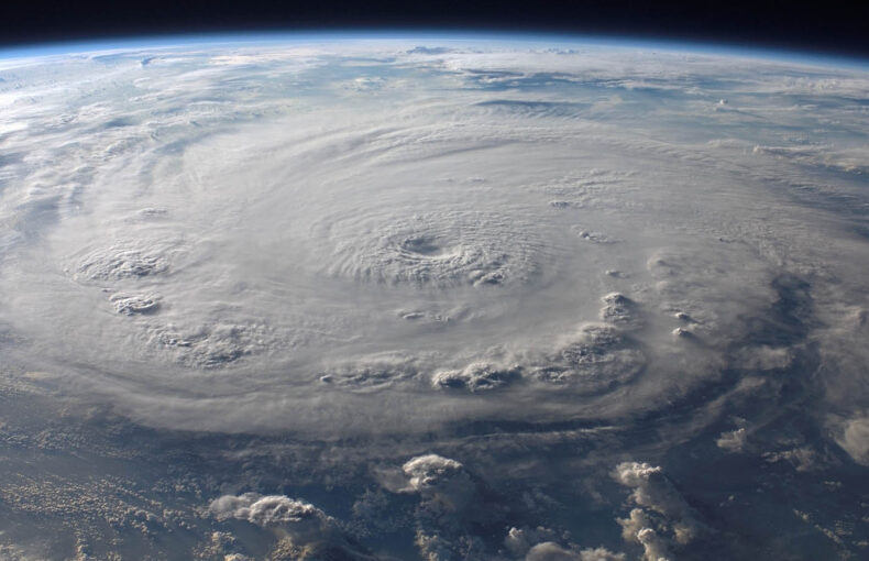 A view of a hurricane forming from space with the clouds circling around