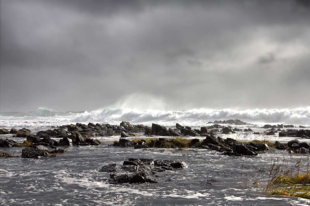 Big ocean storm, tidal bore (heavy sea) and dangerous basalt reefs