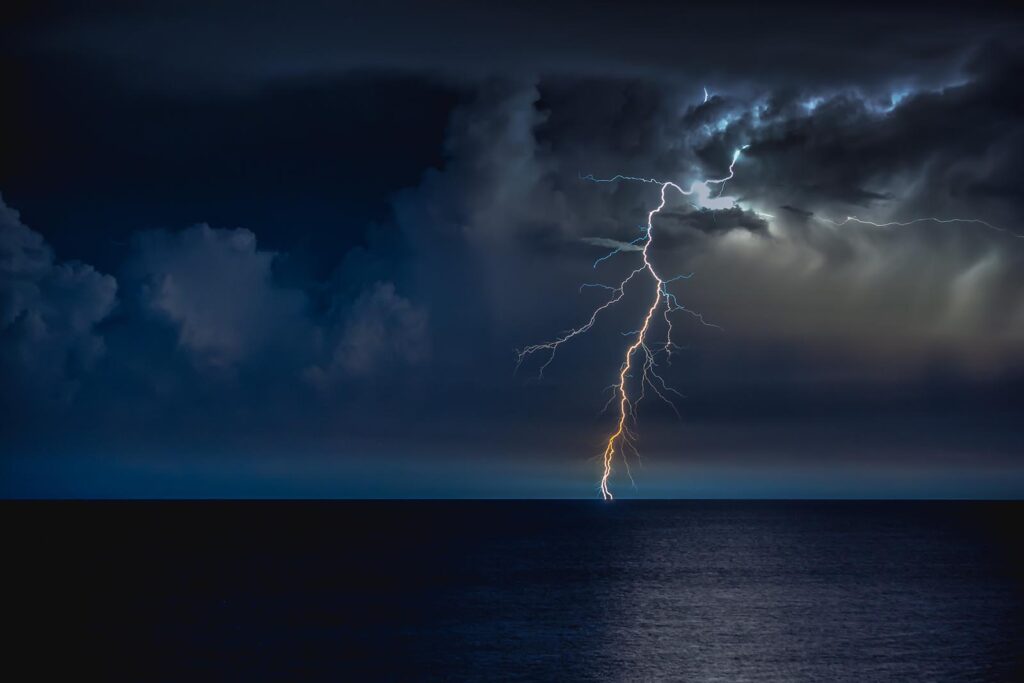 Lightning strike over the ocean