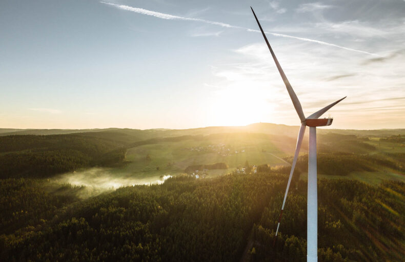 Wind Turbine in the sunset seen from an aerial view